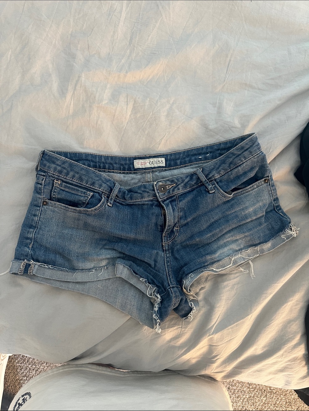GUESS Distressed Blue Denim Low-Rise Cutoff Shorts